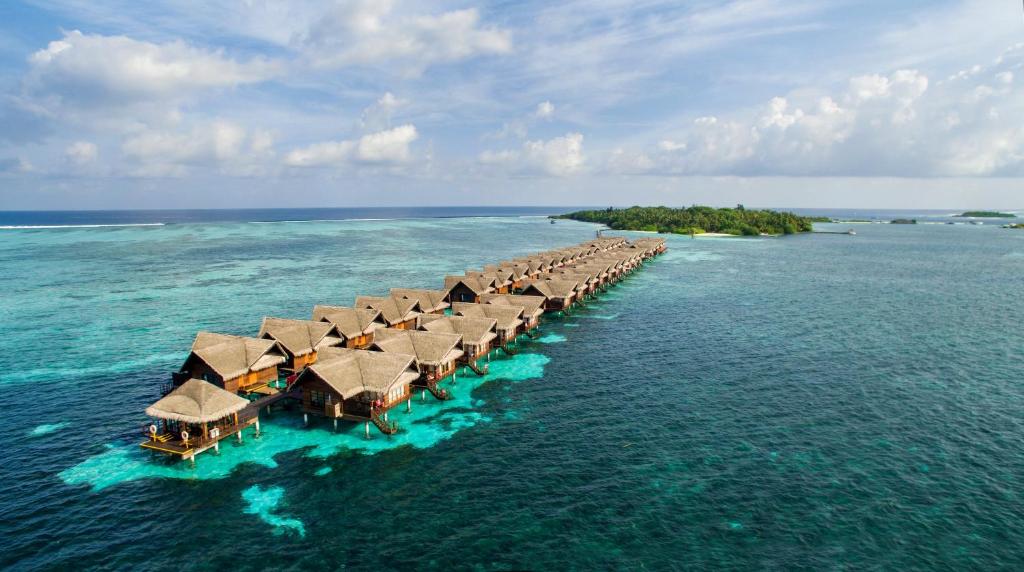 Adaaran Select Hudhuranfushi - ocean villas, águas cristalinas no resort all inclusive nas Ilhas Maldivas