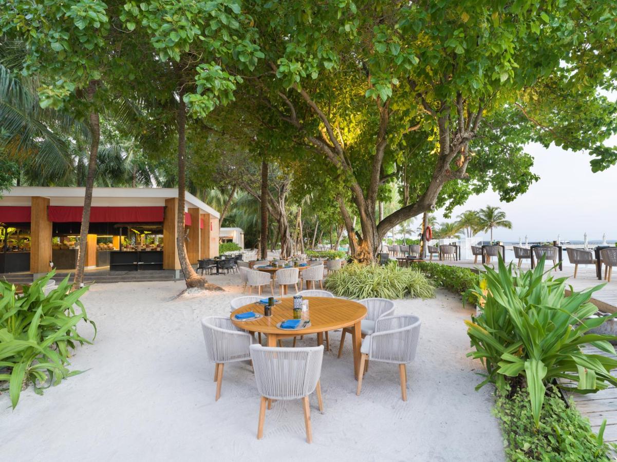 Amilla Maldives Resort and Residences - jantar ao ar livre, ambiente tropical no resort de luxo nas Ilhas Maldivas
