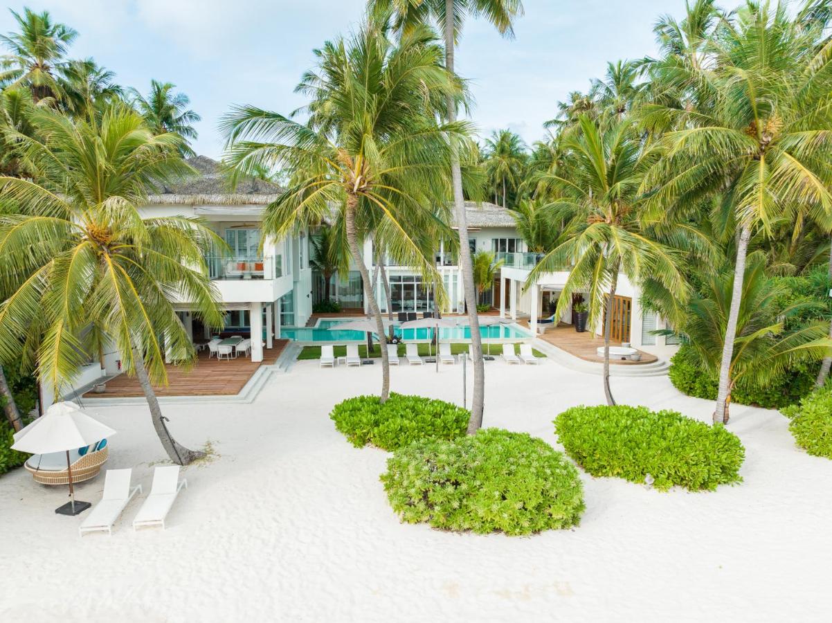 Amilla Maldives Resort and Residences - resort luxuoso, palmeiras no resort de luxo nas Ilhas Maldivas