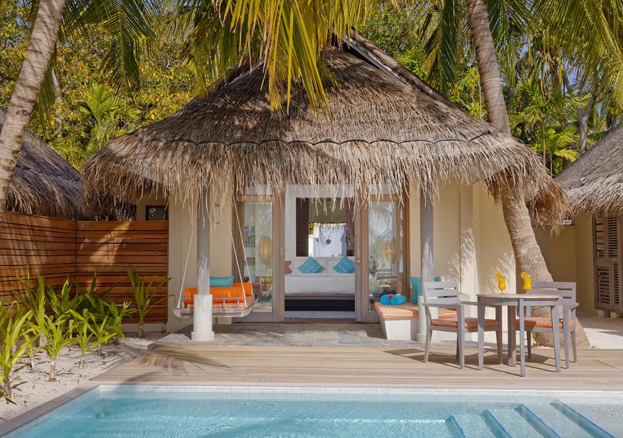Anantara Dhigu Maldives Resort - telhado de palha, piscina privativa no resort de luxo nas Ilhas Maldivas