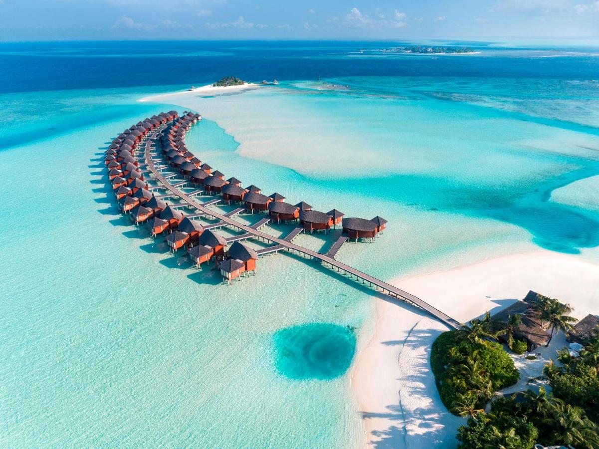 Anantara Dhigu Maldives Resort - villas sobre a água, águas turquesa no resort de luxo nas Ilhas Maldivas