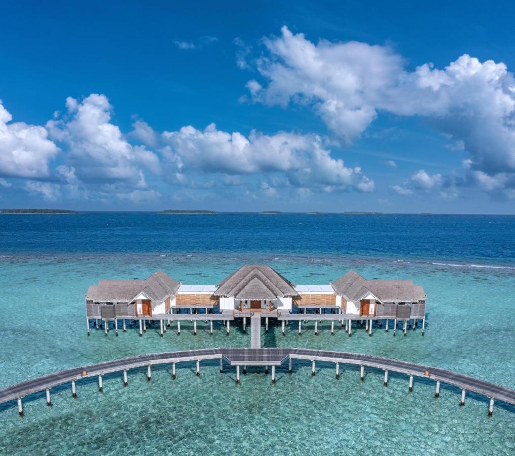 Anantara Kihavah Maldives Villas - villas sobre a água, águas turquesa no resort de luxo nas Ilhas Maldivas