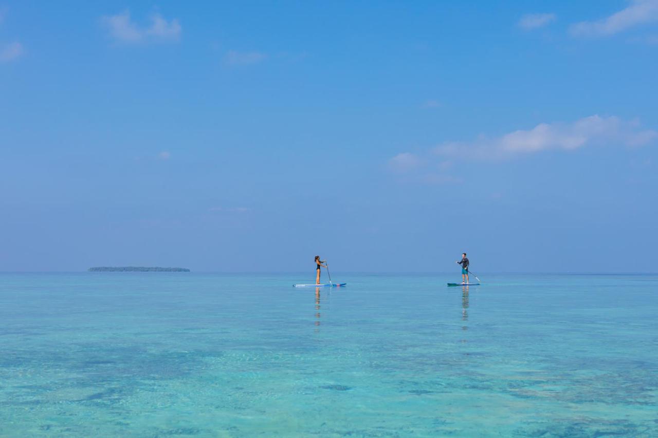 Emerald Faarufushi - paddleboarding, águas turquesa no resort de luxo nas Ilhas Maldivas