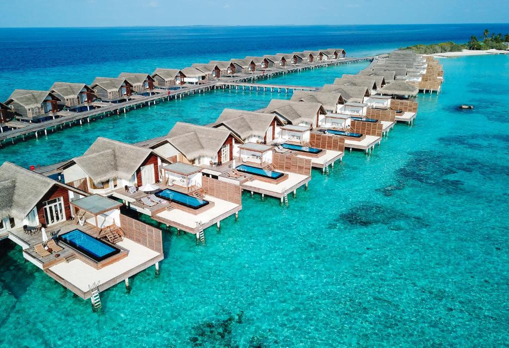 Fairmont Maldives Sirru Fen - villas sobre a água, piscinas privativas no resort de luxo nas Ilhas Maldivas