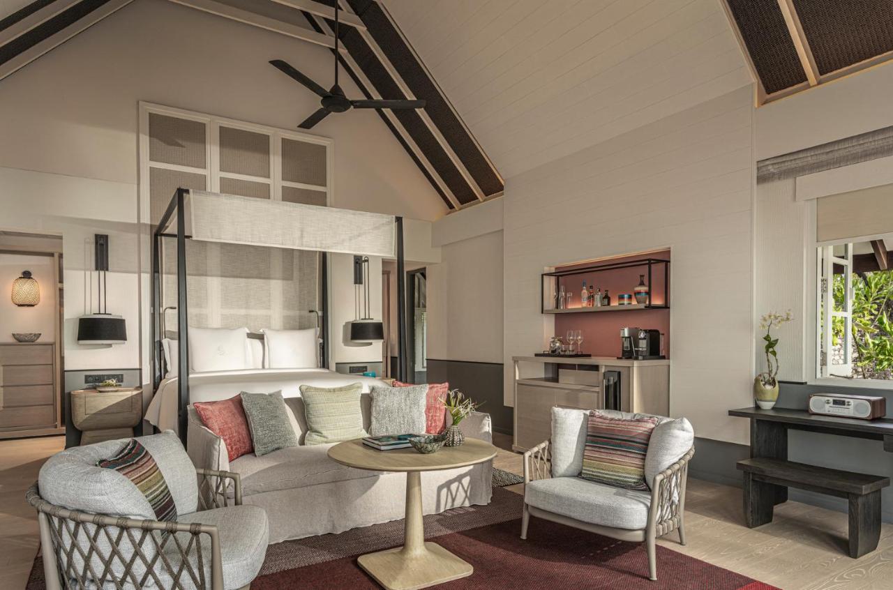 Four Seasons Resort Maldives at Landaa Giraavaru - luxuoso, cama com dossel no resort de luxo nas Ilhas Maldivas