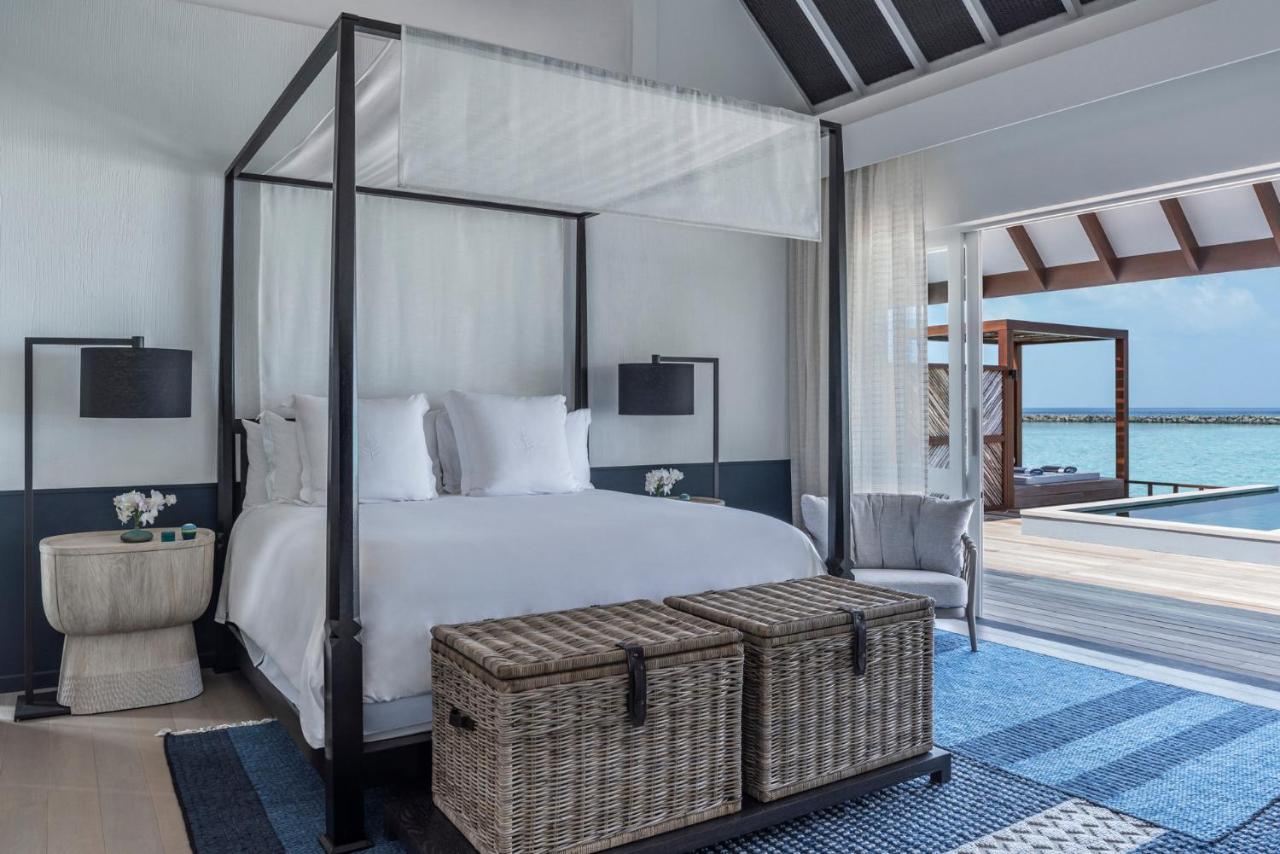 Four Seasons Resort Maldives at Landaa Giraavaru - luxuoso, cama com dossel no resort de luxo nas Ilhas Maldivas