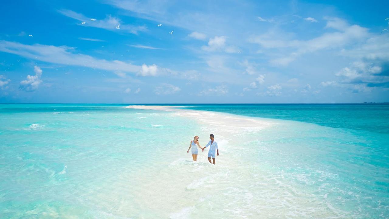 Jawakara Islands Maldives - águas turquesas, banco de areia no resort de luxo nas Ilhas Maldivas