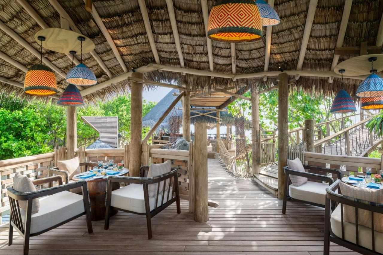 JW Marriott Maldives - telhado de palha, ambiente tropical no resort de luxo nas Ilhas Maldivas