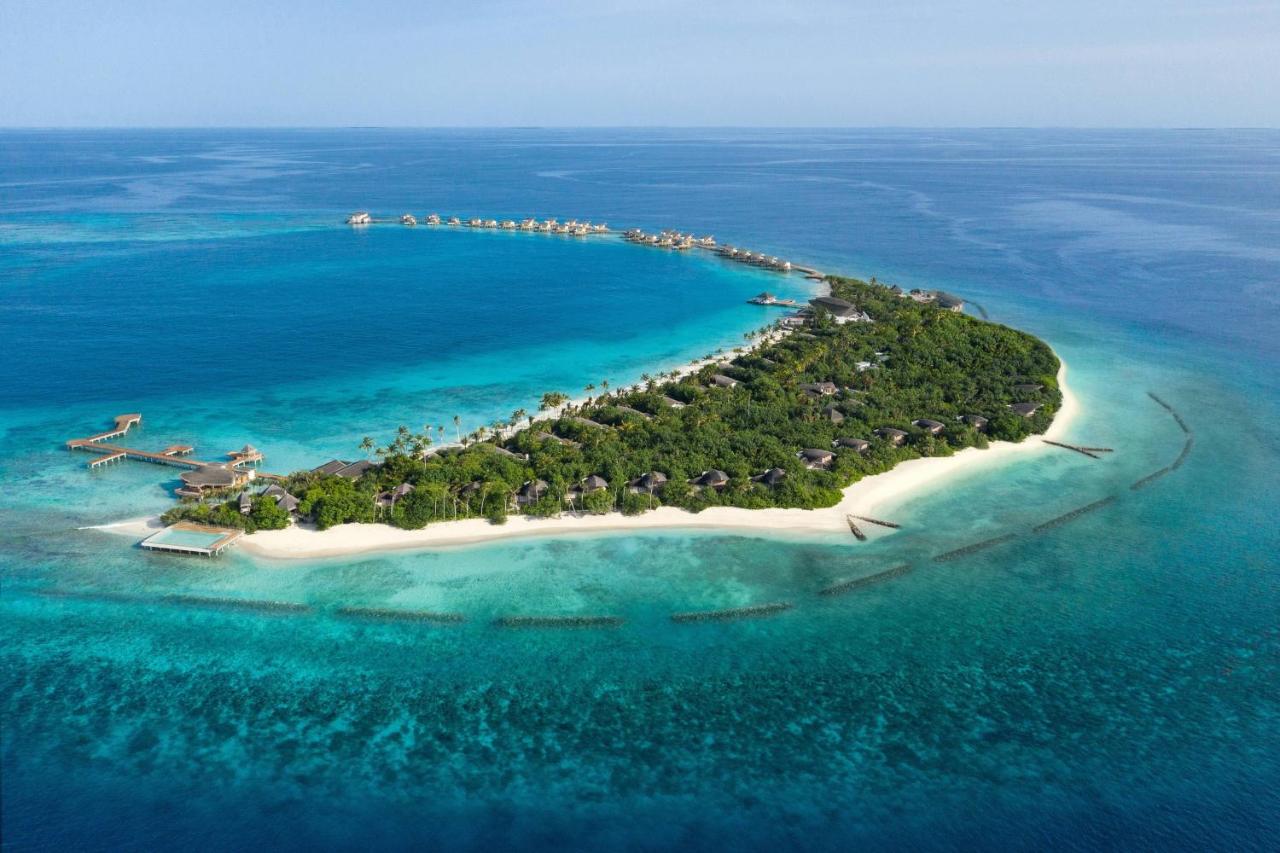 JW Marriott Maldives - villas sobre a água, águas turquesa no resort de luxo nas Ilhas Maldivas
