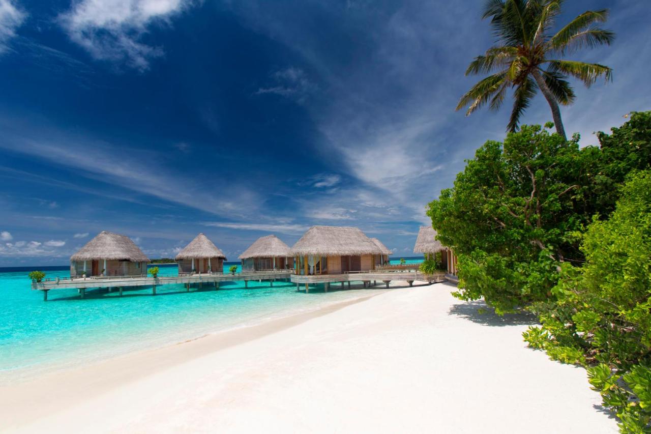Milaidhoo Island Maldives - villas sobre a água, águas turquesa no resort de luxo nas Ilhas Maldivas