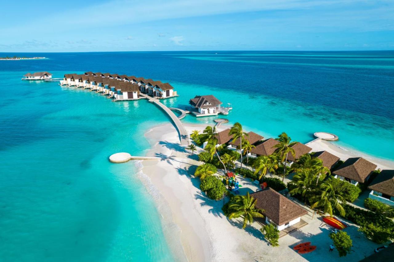 NOOE Maldives Kunaavashi - villas sobre a água, águas turquesa no resort de luxo nas Ilhas Maldivas