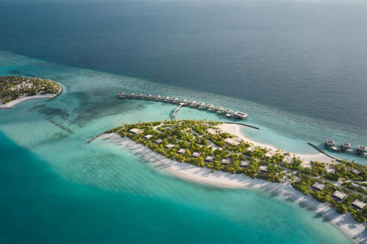 Patina Maldives - villas sobre a água, águas turquesa no resort de luxo nas Ilhas Maldivas