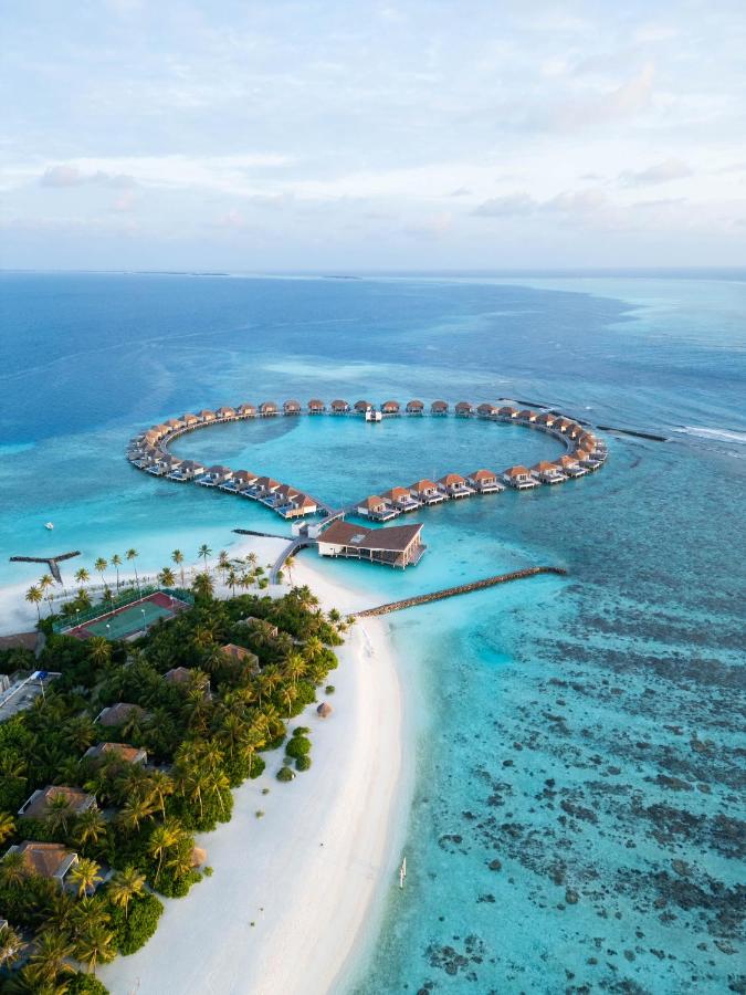 Radisson Blu Resort Maldives - villas sobre a água, águas turquesa no resort de luxo nas Ilhas Maldivas