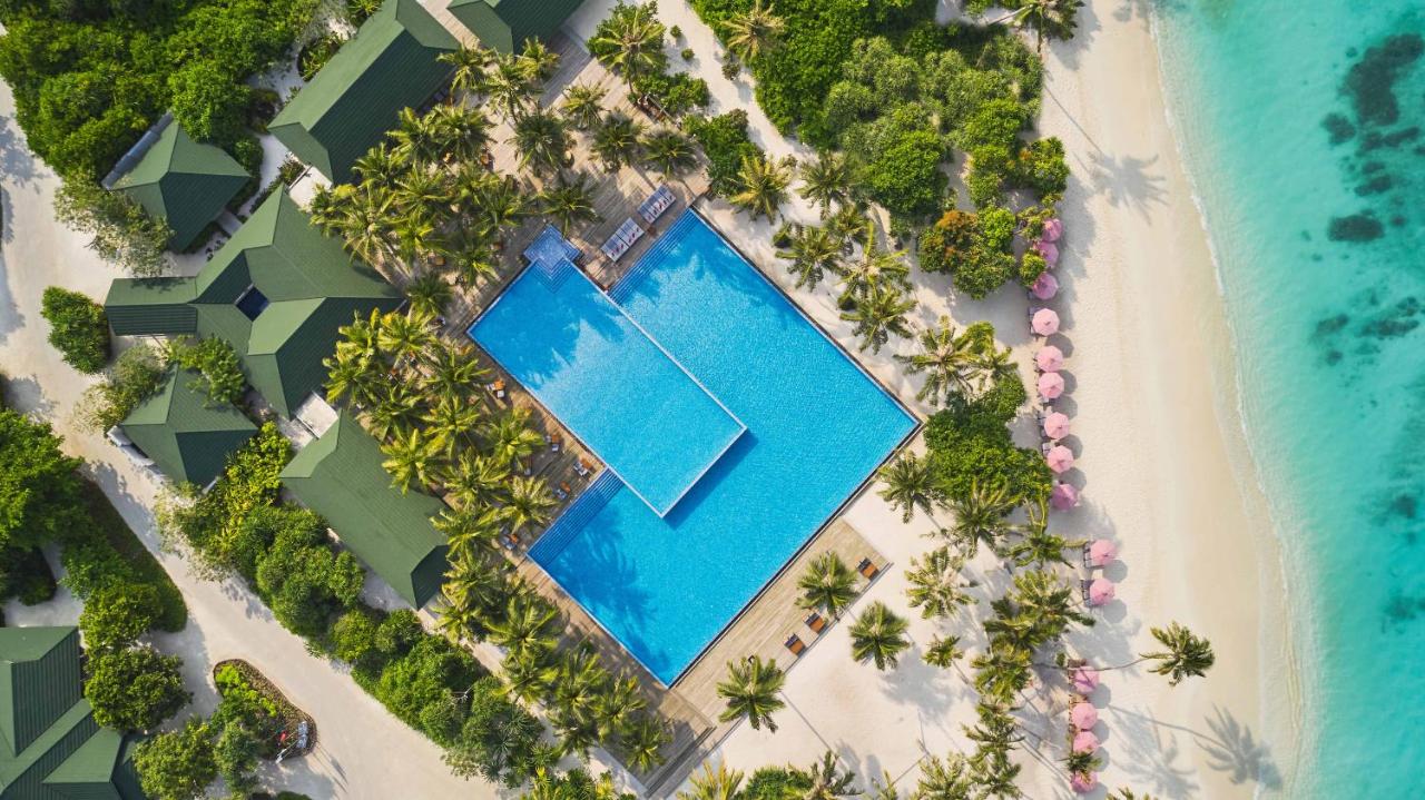 Siyam World Maldives - piscina infinita, vegetação tropical no resort de luxo nas Ilhas Maldivas
