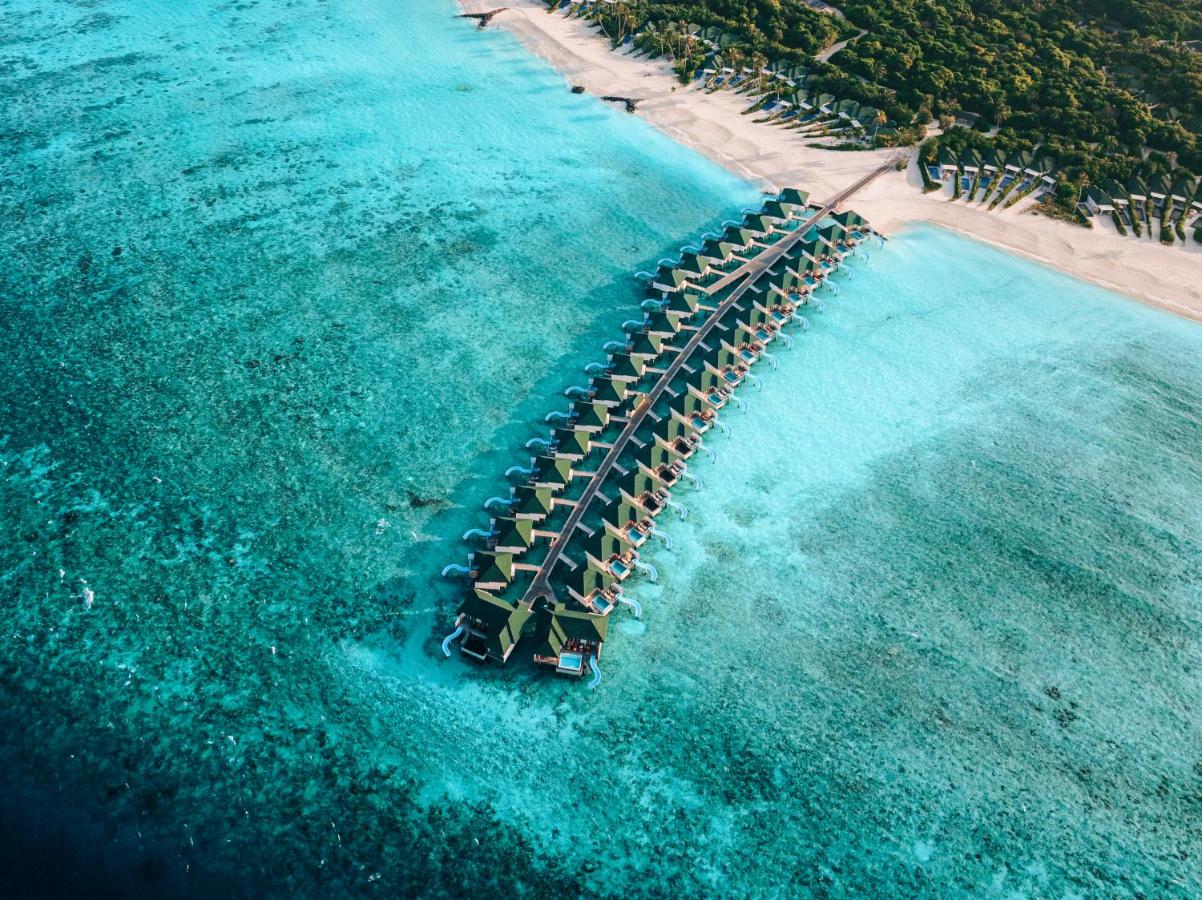 Siyam World Maldives - villas sobre a água, águas turquesa no resort de luxo nas Ilhas Maldivas