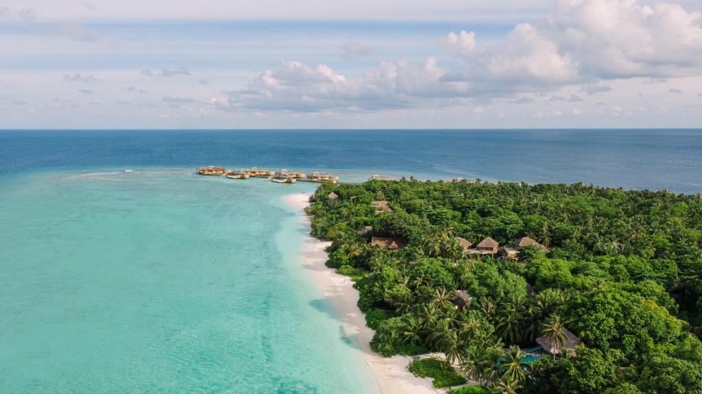 Soneva Fushi - villas sobre a água, águas turquesa no resort de luxo nas Ilhas Maldivas