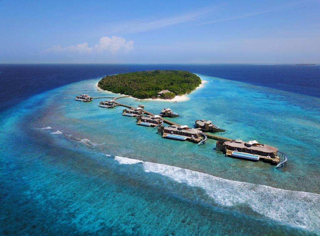 Soneva Fushi - villas sobre a água, águas turquesa no resort de luxo nas Ilhas Maldivas