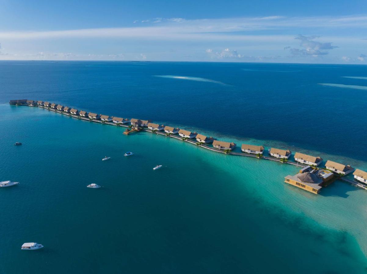 Waldorf Astoria Maldives Ithaafushi - villas sobre a água, águas turquesa no resort de luxo nas Ilhas Maldivas